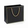 Borsa regalo 30 x 12 x 35 cm in carta nera con manici in corda dorata