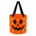 Borsa portadolci zucca diametro 30 cm altezza 28 cm in tessuto arancione con luci decorative