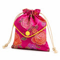 Sacchetto con coulisse 18 x 15 cm in tessuto satinato fucsia con ricamo floreale