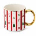 Tazza 350 ml in ceramica bianca e rossa con manico dorato - stile natalizio
